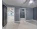Simple bedroom with a large closet and gray walls at 2101 N Wolf Cv, Martinsville, IN 46151