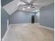 Large bonus room featuring a ceiling fan and gray walls at 2101 N Wolf Cv, Martinsville, IN 46151