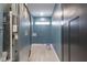 Bright laundry room with gray walls and vinyl flooring at 2101 N Wolf Cv, Martinsville, IN 46151