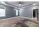 Main bedroom with coffered ceiling and gray walls at 2101 N Wolf Cv, Martinsville, IN 46151