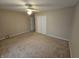 Bright bedroom with ceiling fan and neutral carpeting at 14 Winchester Ct, Anderson, IN 46013