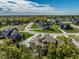 An aerial view of a suburban neighborhood featuring mature trees and winding streets at 340 Beechwood Farm Ln, Indianapolis, IN 46260