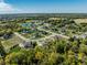 A desirable community showcasing elegant homes, a serene lake, and lush landscaping at 340 Beechwood Farm Ln, Indianapolis, IN 46260