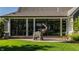 Beautiful backyard features manicured lawn, patio, and a unique metal elephant sculpture at 340 Beechwood Farm Ln, Indianapolis, IN 46260