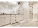 Bright bathroom featuring a large vanity, granite countertop, and glass-enclosed shower at 340 Beechwood Farm Ln, Indianapolis, IN 46260
