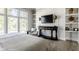 Bright bedroom with a large window, stylish console, shelves and comfortable seating at 340 Beechwood Farm Ln, Indianapolis, IN 46260