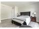 Bedroom featuring elegant furniture, wood floors, and natural light at 340 Beechwood Farm Ln, Indianapolis, IN 46260