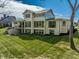 A spacious home featuring a walkout basement and large windows at 340 Beechwood Farm Ln, Indianapolis, IN 46260