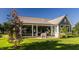 Stylish single-Gathering home with a manicured lawn, an elephant sculpture, and big windows at 340 Beechwood Farm Ln, Indianapolis, IN 46260