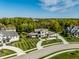 Stunning home featuring a well manicured lawn with fresh stripes and a private circular driveway at 340 Beechwood Farm Ln, Indianapolis, IN 46260