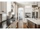 Gourmet kitchen features custom cabinets, modern appliances, and an eat-in center island at 340 Beechwood Farm Ln, Indianapolis, IN 46260