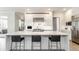 Spacious kitchen with a large island, modern appliances, ample counter space, and stylish bar stools at 340 Beechwood Farm Ln, Indianapolis, IN 46260