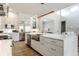 Open kitchen design showcasing stainless steel appliances, a center island, and modern cabinetry with sleek hardware at 340 Beechwood Farm Ln, Indianapolis, IN 46260