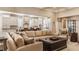 Open concept living room flowing into kitchen featuring neutral color palette and modern decor at 340 Beechwood Farm Ln, Indianapolis, IN 46260