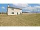 Spacious backyard with vinyl siding and well-maintained grassy area at 11851 Fawn Crest Dr, Indianapolis, IN 46235