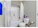 Bathroom showcasing a shower-tub combo and essential fixtures at 11851 Fawn Crest Dr, Indianapolis, IN 46235