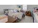 Bedroom with natural lighting and a cozy queen-sized bed at 11851 Fawn Crest Dr, Indianapolis, IN 46235