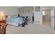 Bright bedroom with a king bed, home gym, and neutral carpet throughout at 11851 Fawn Crest Dr, Indianapolis, IN 46235