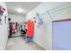Walk-in closet with ample hanging storage for clothes and accessories at 11851 Fawn Crest Dr, Indianapolis, IN 46235
