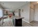 Open concept kitchen with island and view of the living room at 11851 Fawn Crest Dr, Indianapolis, IN 46235