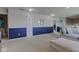 Inviting living room with blue wainscoting and a neutral carpet at 11851 Fawn Crest Dr, Indianapolis, IN 46235