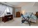 Bedroom featuring a desk, dresser and an exercise bike at 11851 Fawn Crest Dr, Indianapolis, IN 46235