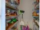 Pantry area with adjustable metal shelving and storage at 11851 Fawn Crest Dr, Indianapolis, IN 46235