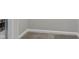 Close up of white door and baseboard in carpeted room with gray walls at 16311 Taconite Dr, Noblesville, IN 46060