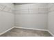 Well-organized walk-in closet featuring carpet floor and wire shelving for storage at 16311 Taconite Dr, Noblesville, IN 46060