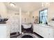 Elegant bathroom featuring a clawfoot tub, modern fixtures, and ample vanity space at 47 Meadow Dr, New Palestine, IN 46163