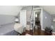 Bright bedroom offers hardwood floors, neutral tones, and a tranquil atmosphere at 47 Meadow Dr, New Palestine, IN 46163