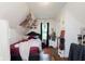 Attic bedroom with a unique design, hardwood floors, and natural light at 47 Meadow Dr, New Palestine, IN 46163