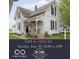 Charming home featuring a cozy front porch, vintage architectural details, and a well-maintained lawn at 47 Meadow Dr, New Palestine, IN 46163