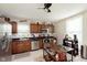 Charming kitchen boasts stainless steel appliances, dark countertops, and an inviting island at 47 Meadow Dr, New Palestine, IN 46163
