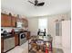 Well-equipped kitchen with wooden cabinetry, stainless steel appliances, and a functional island at 47 Meadow Dr, New Palestine, IN 46163
