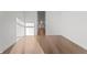 Minimalist bedroom with hardwood floors and bright natural light at 1155 S Rangeline Rd # 501, Carmel, IN 46032