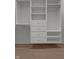 Walk-in closet with built-in shelving, drawers and hanging racks at 1155 S Rangeline Rd # 501, Carmel, IN 46032