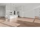 Spacious kitchen with an island, stainless steel appliances, and open floor plan at 1155 S Rangeline Rd # 501, Carmel, IN 46032