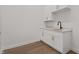 Laundry Room with white cabinets and quartz countertop at 1155 S Rangeline Rd # 501, Carmel, IN 46032