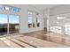 Bright living room with an expansive balcony and hardwood floors at 1155 S Rangeline Rd # 501, Carmel, IN 46032