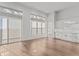 Open-concept living area with modern cabinets and large windows offering ample natural light at 1155 S Rangeline Rd # 501, Carmel, IN 46032
