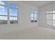 Bright room featuring large windows with ample natural light, offering a serene living space at 1155 S Rangeline Rd # 506, Carmel, IN 46032