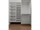 Walk-in closet with built-in shelving and ample storage space for organization at 1155 S Rangeline Rd # 506, Carmel, IN 46032