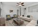 Inviting living room with neutral seating, hardwood floors, and an open layout perfect for entertaining guests at 2434 N Pennsylvania St, Indianapolis, IN 46205