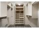 Walk-in closet with custom shelving and ample storage space at 725 Sugarbush Dr, Zionsville, IN 46077