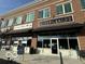 Exterior of Fit Club with large windows, black awnings, and nearby fitness center sign at 13094 Overview Dr # 5D, Fishers, IN 46037