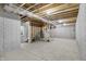 Unfinished basement with high ceilings and ample space for customization at 1647 Sheldon St, Indianapolis, IN 46218