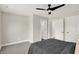 Cozy bedroom with ceiling fan and double closets at 1647 Sheldon St, Indianapolis, IN 46218