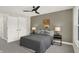 Bright bedroom with ceiling fan and large windows at 1647 Sheldon St, Indianapolis, IN 46218