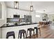 Modern kitchen with white cabinets, stainless steel appliances, and an island at 1647 Sheldon St, Indianapolis, IN 46218